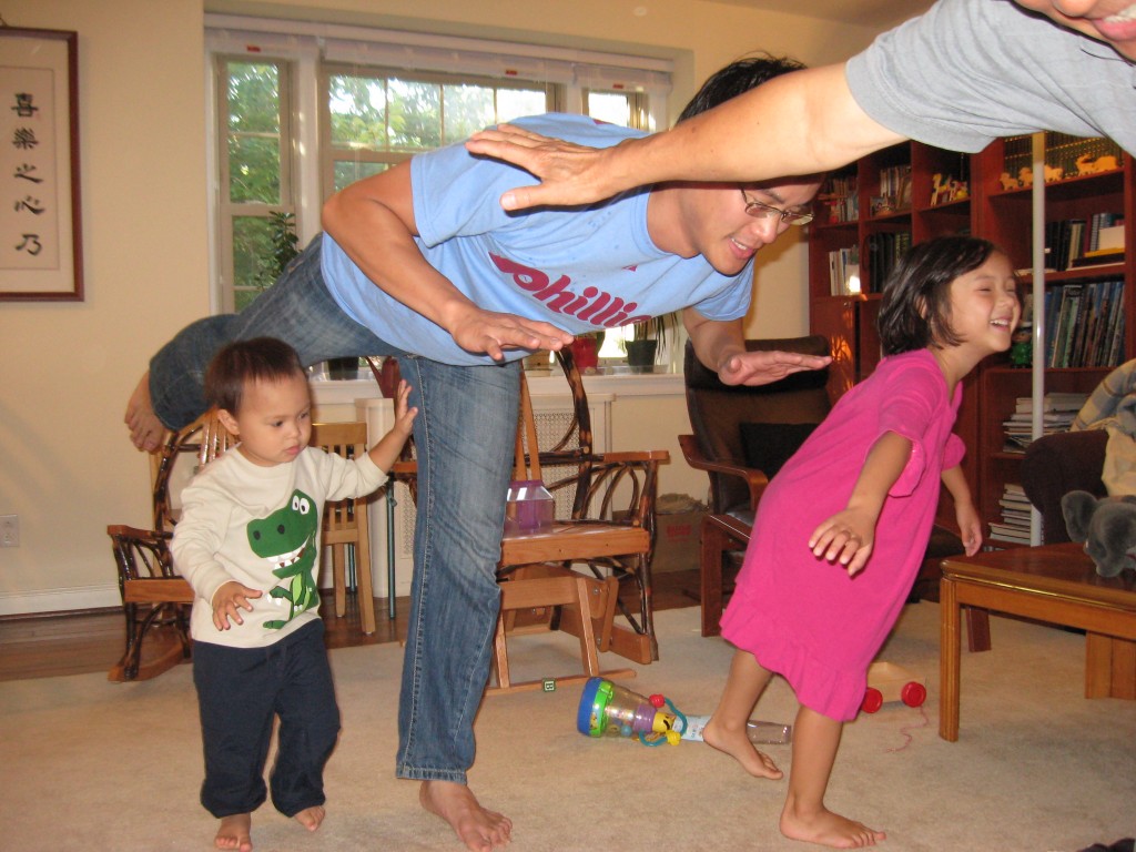 Stretching with the Niece and Nephew and Grandpa Stretching with the Niece and Nephew