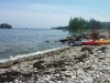 Watching Kayaks by the Coast